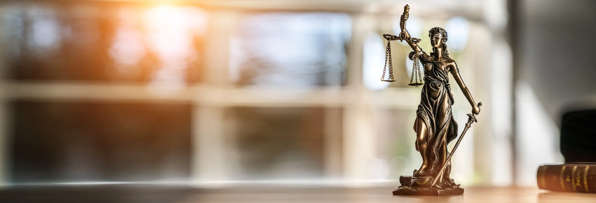 Lady justice statue regarding a lawsuit filed against the Calgary hotel where a guest was raped in her room by a staff member