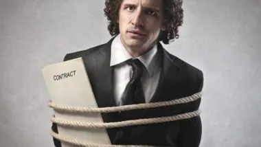 Man bound with rope and a contract regarding information on whether a class action lawsuit is a legally binding contract or not