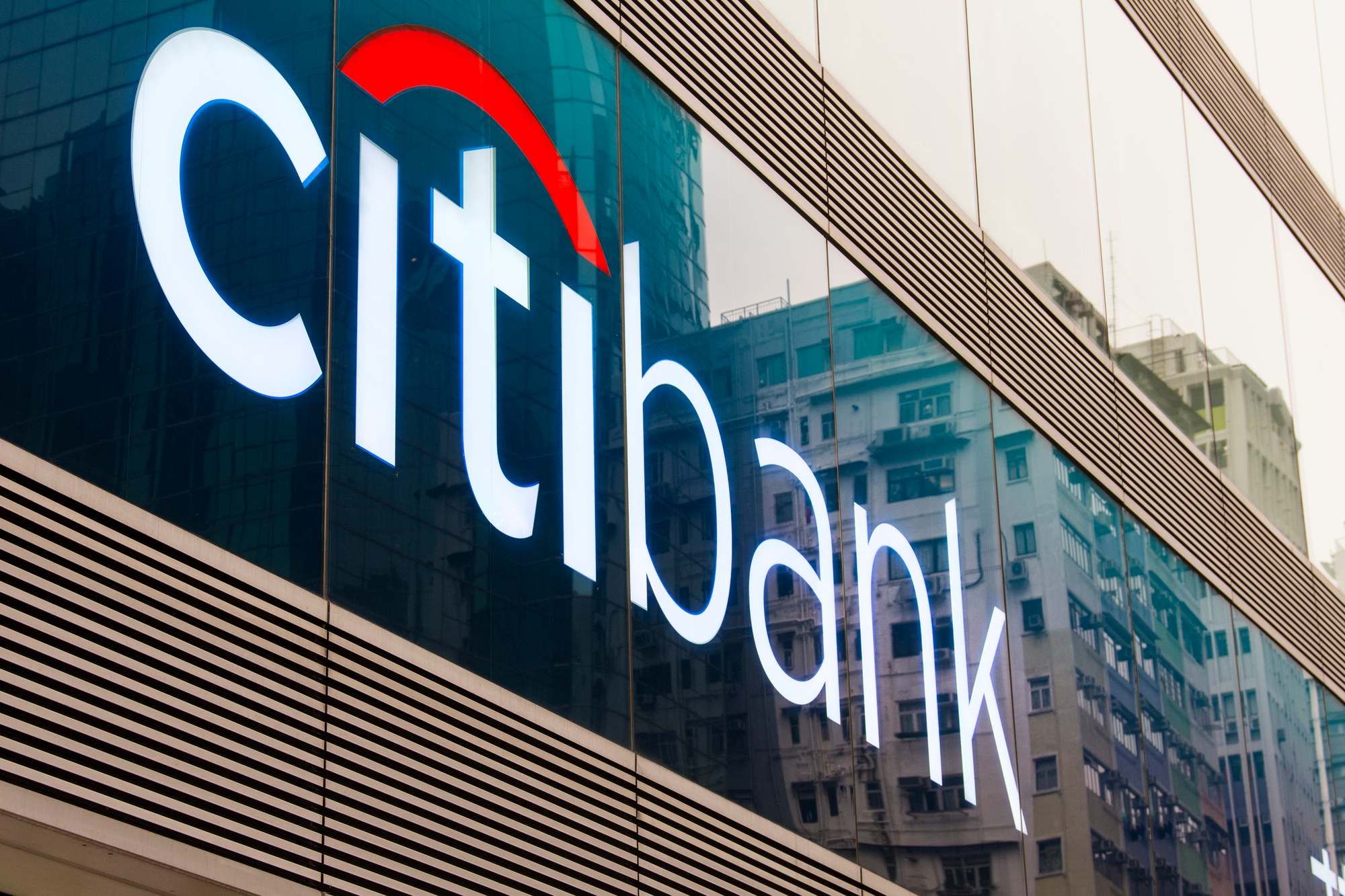 A Citibank sign regarding a Calgary couple suing the bank for selling millions of shares during COVID-19 chaos