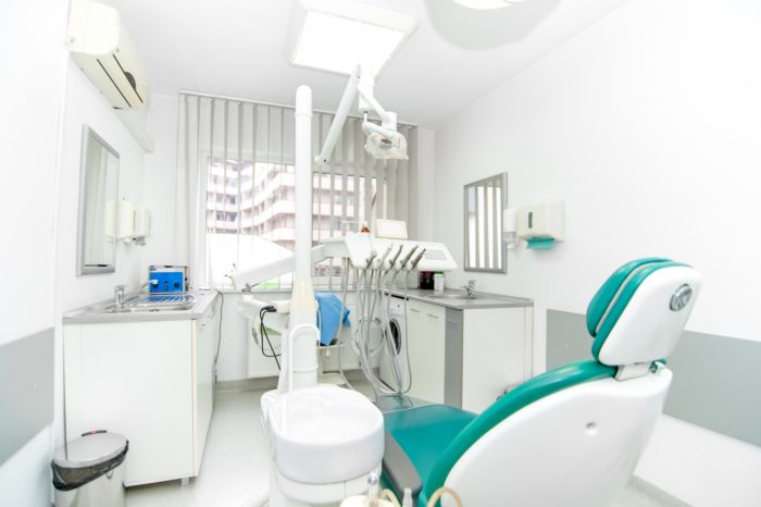 Empty dentist office regarding the dental clinic class action lawsuit filed after an insurance company denied a business loss claim