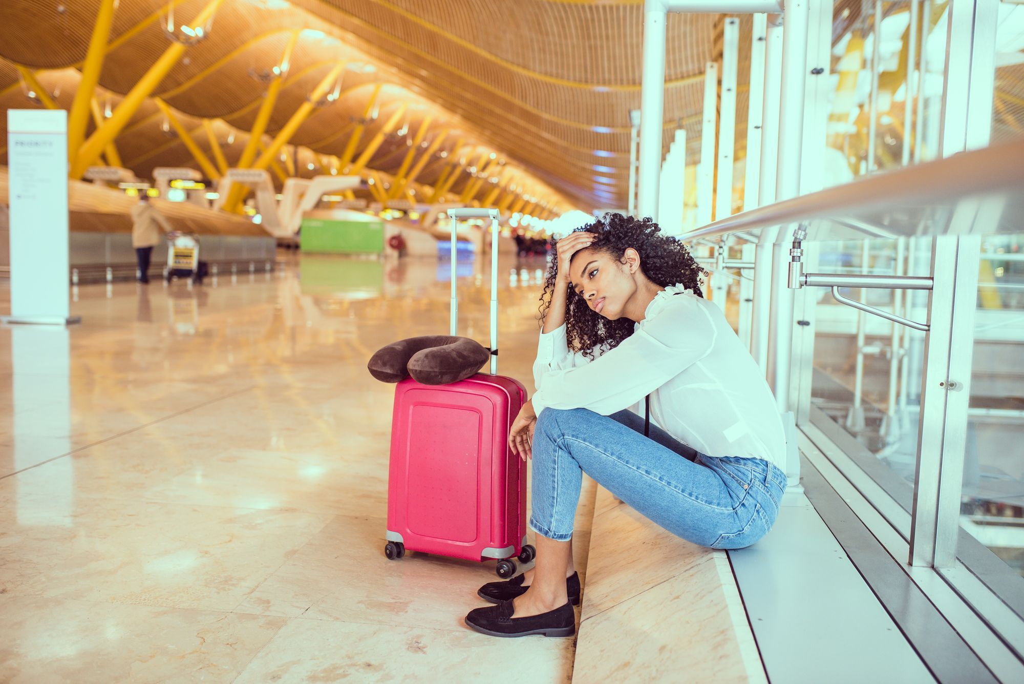 Woman upset at the airport regarding the second class action filed against Canadian airlines by Air Passenger Rights over passengers' refunds