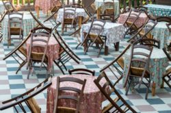 Empty tables and chairs regarding the Intact Insurance Company class action lawsuit filed after business interruption claim denied 
