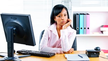 Woman upset at work regarding the Procom class action lawsuit filed over Employees being misclassified