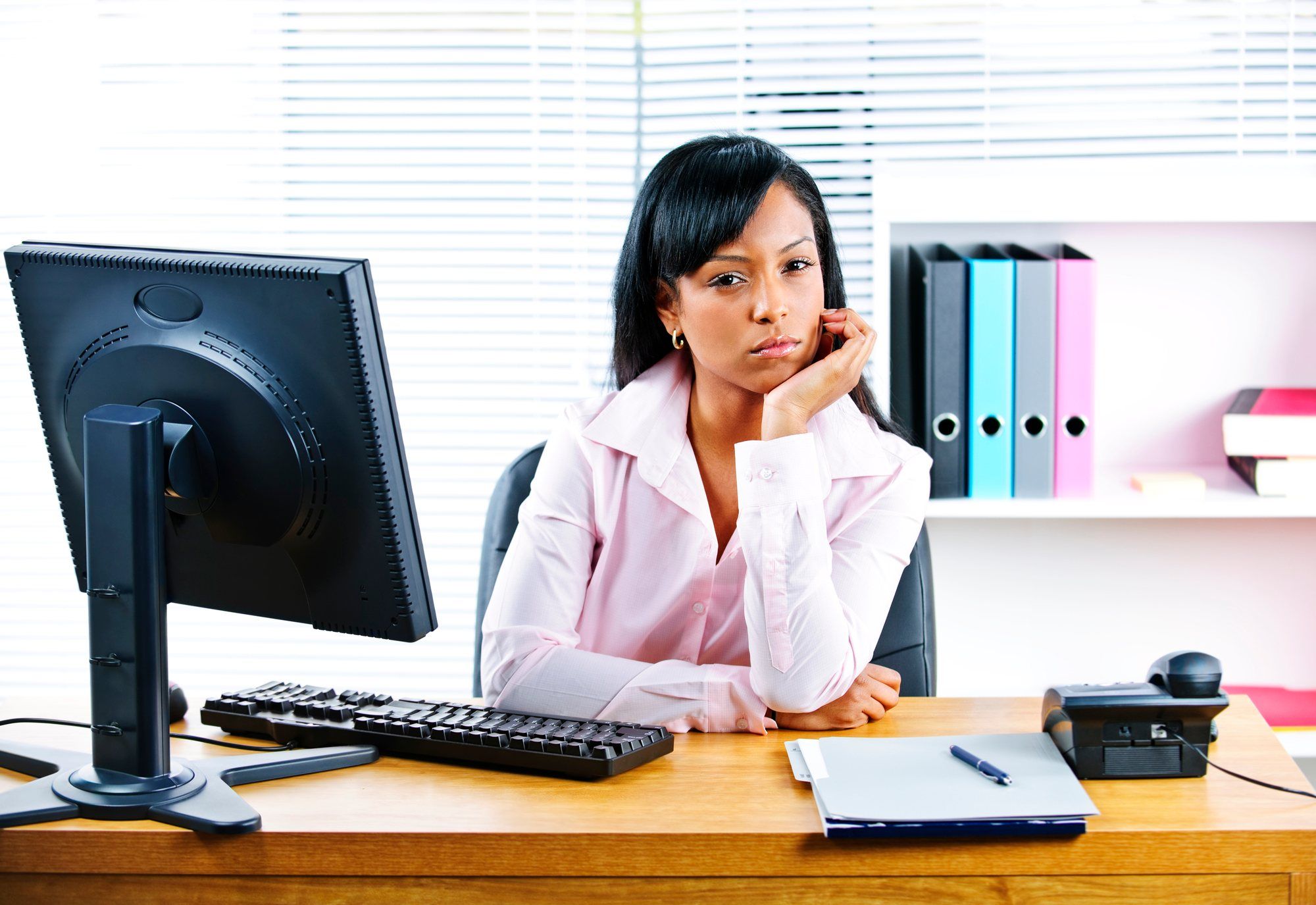 Woman upset at work regarding the Procom class action lawsuit filed over Employees being misclassified