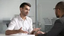 Man talking with lawyer regarding information on long term disability insurance in Canada