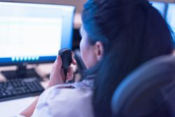 Femle security guard regarding the security guard class action lawsuit settlement