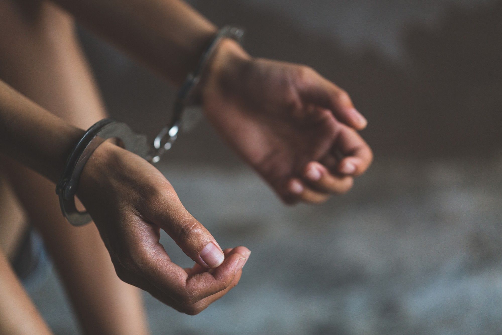 Handcuffs on person regardig the illegal strip search in prisons class action lawsuit filed 