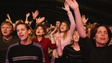 Gospel for Asia Church members worshiping together amid class action