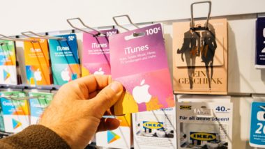 Person buying APple gift cards regarding the Apple gift card scam class action lawsuit