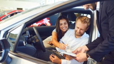 Couple purchasing a car