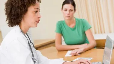 Doctor entering patient info regarding the Central Health privacy breach class action lawsuit