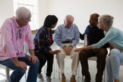 group of elderly people involved in abuse class action