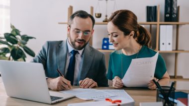 Lawyer helping client regarding information on how to hire a long-term disability lawyer