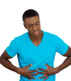 Man having stomach pains regarding the Canada recall due to a salmonella outbreak 