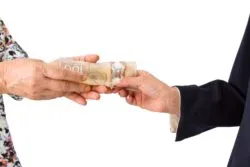 People passing money regarding the immigration lawyer fraud class action lawsuit filed