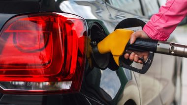 Person filling up car regarding the B.C. gas prices class action lawsuit