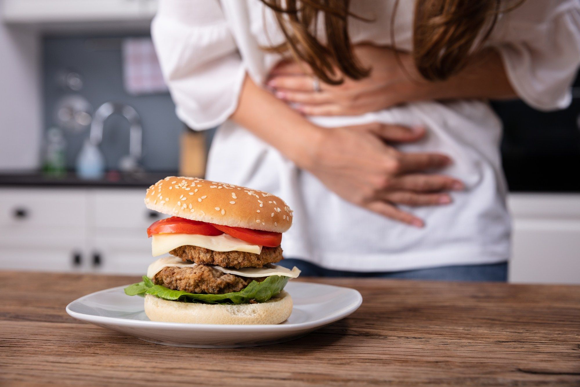 woman sick from burger regarding the salmonella onions lawsuit filed