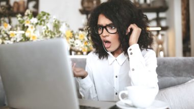 woman reading shocking news regarding information on what to do if your employee benefits LTD insurance is revoked