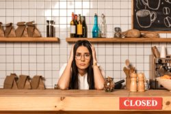 Stressed business owner regarding the business interruption class action lawsuit filed 