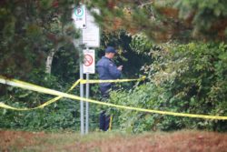 RCMP officer at a taped off scene regarding the missing indigenous women class action lawsuit seeking certification 