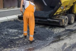 construction worker working on bike lane