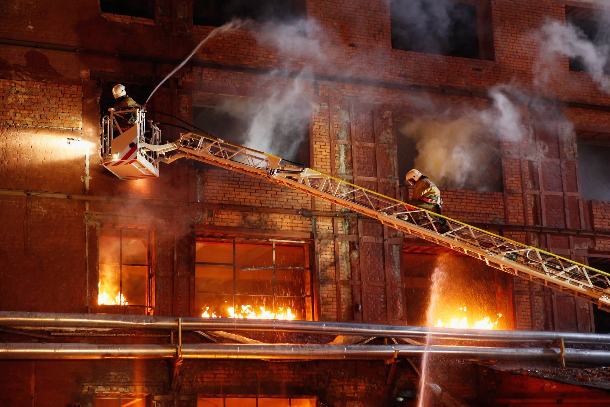 Firefighters battling flames regarding the Econo Lodge Motel class action filed 