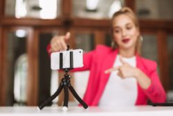 Girl recording dance on cell regarding the TikTok users class action lawsuit filed 