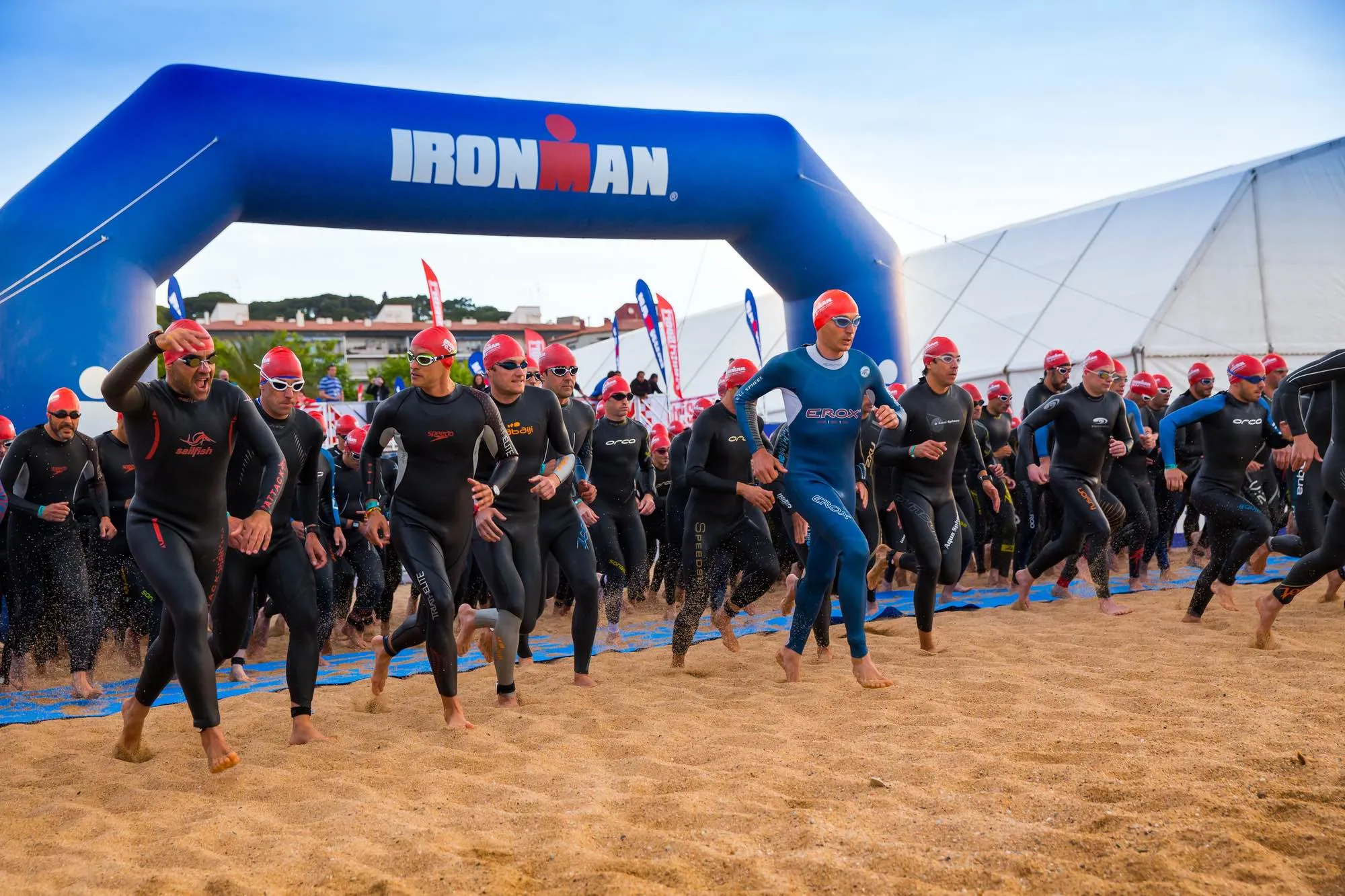 people racing ironman triathlon 