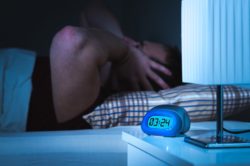 Man struggling to sleep regarding Toronto's ne short-term rental bylaws