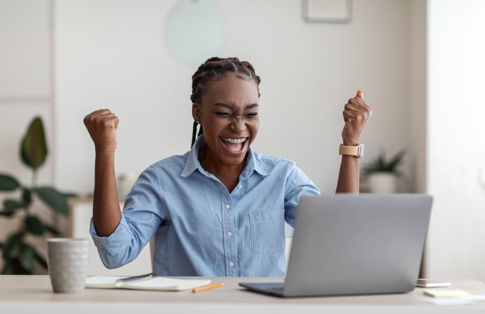 Excited woman regarding WestJet deciding to offer COVID-19 refunds