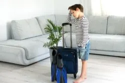 Little boy upset with suitcase regarding the Old Republic class action lawsuit