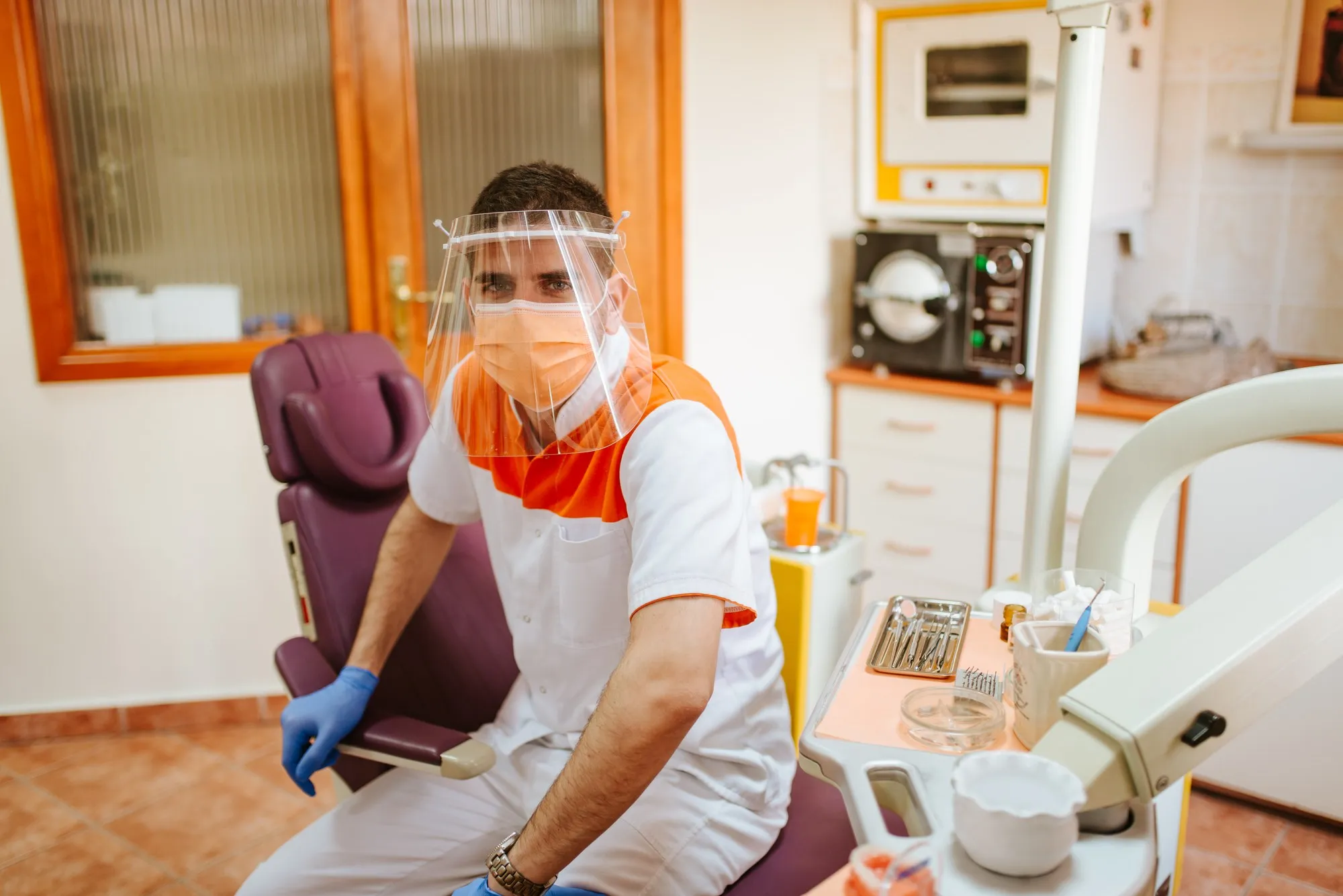 Dentist sitting with masks on regarding the Aviva Insurance breach of contract class action lawsuit filed 