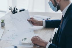 business man looking at business chart