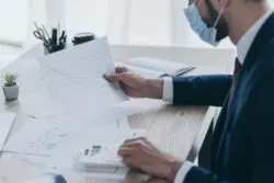 business man looking at business chart