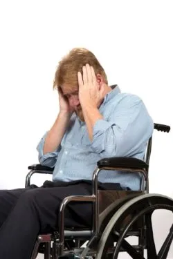 Upset man in a wheelchair regarding the MDC class action lawsuit alleging abuse