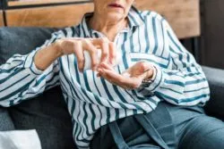 Person taking opioids regarding the Alberta opioid treatment program lawsuit 