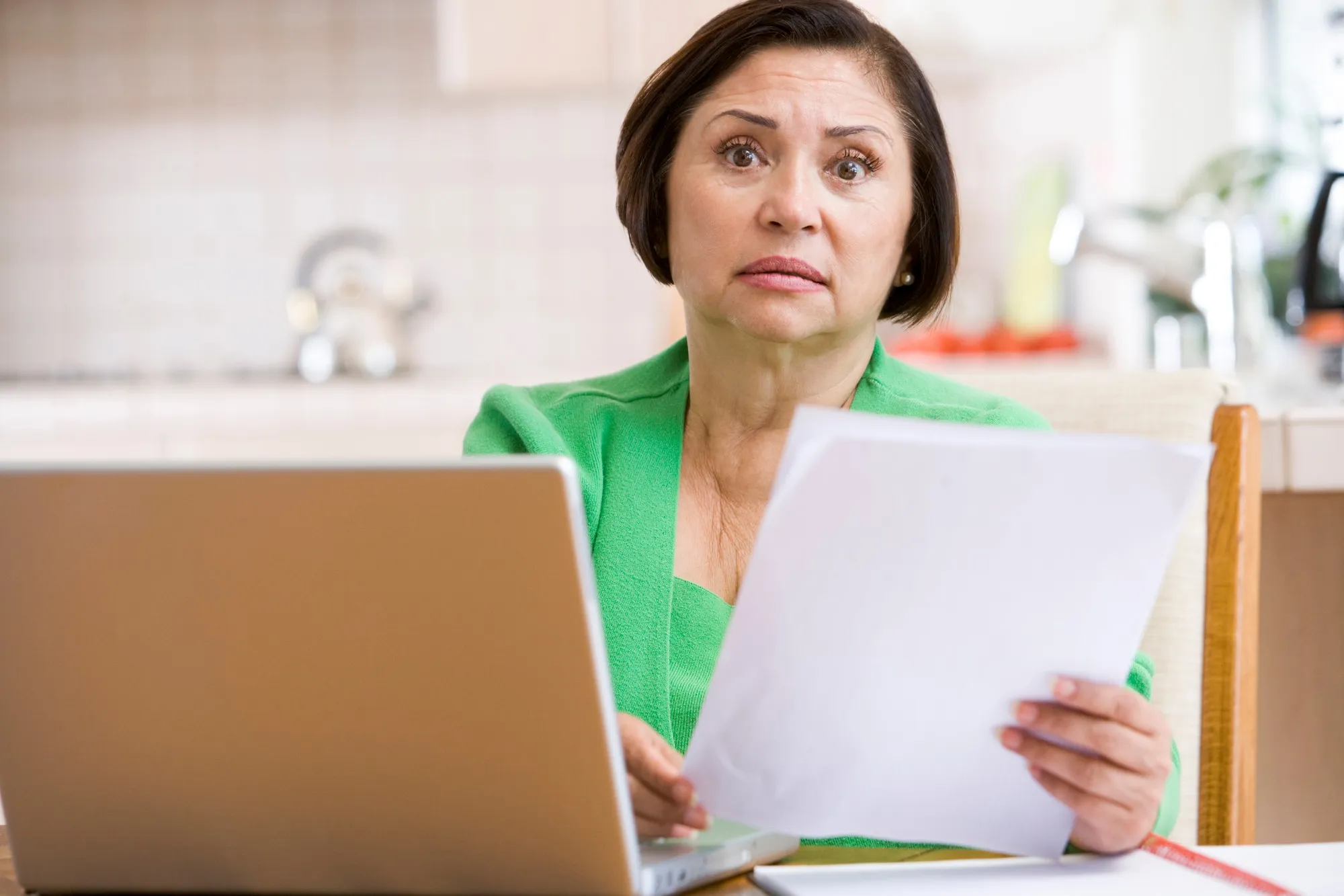 Person holding denial letter regaridng information onwhat to do if your BMO insurance claim is denied