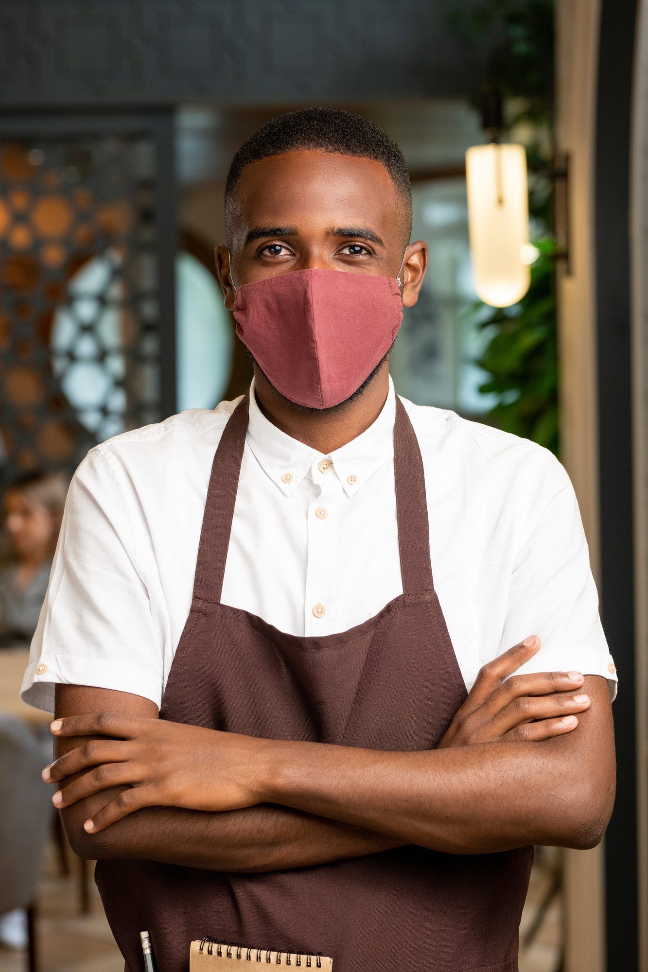 Business owner with arms folded regarding the Aviva denied coverage class action lawsuit filed