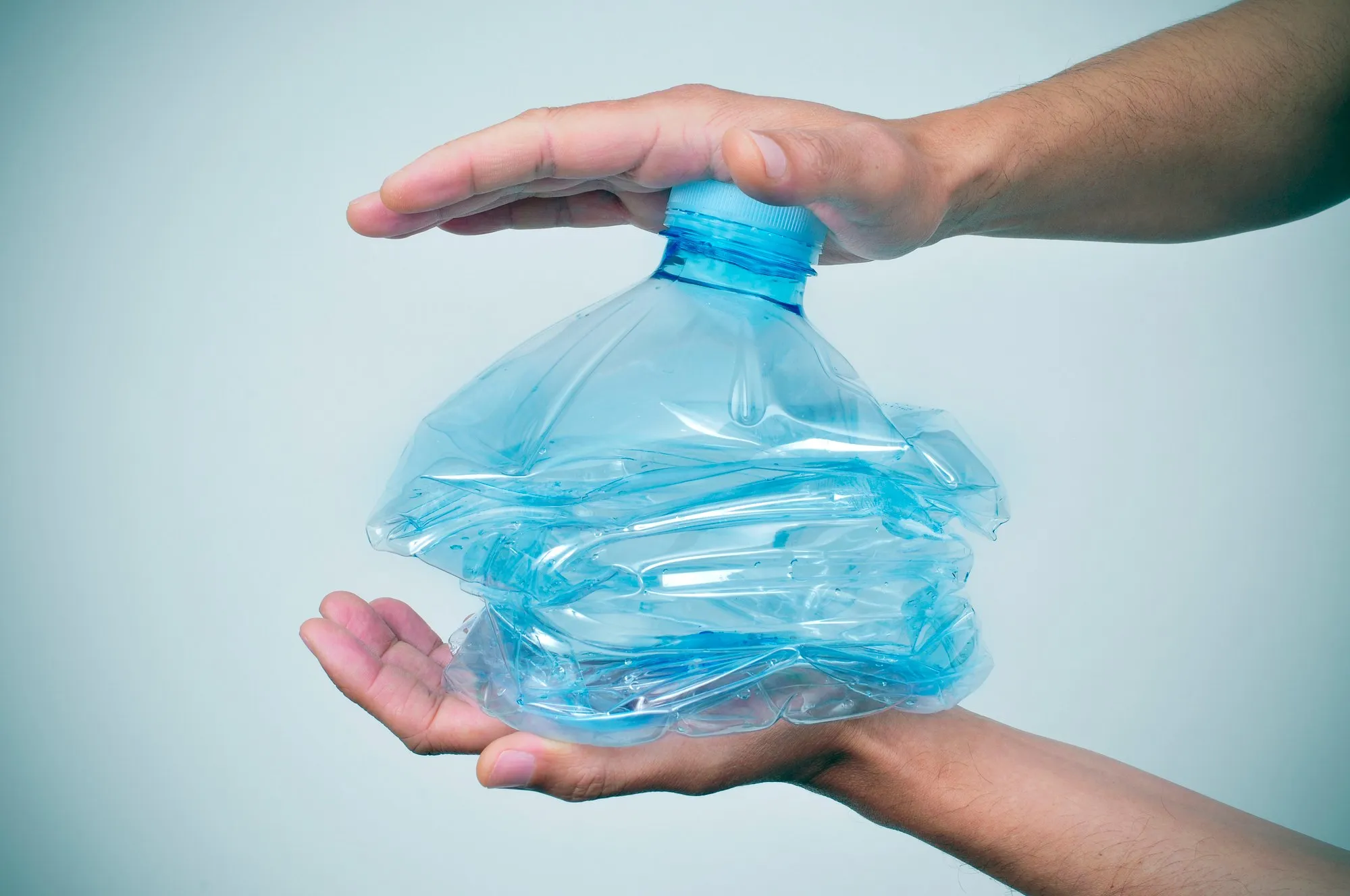 Person smashing plastic regarding the LOOP Canada class action lawsuit