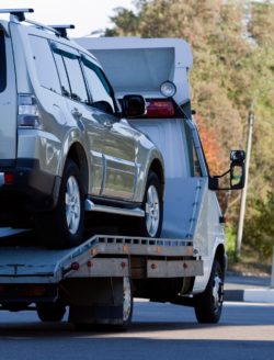 Dodge being towed away regarding the FCA TPMS defect class action lawsuit 