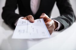 Highway 13 settlement cheque