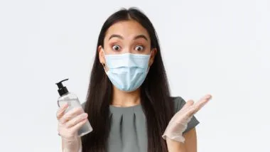 woman questioning hand sanitizer as Quebec launches investigation