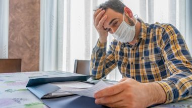 Frustrated business owner with calendar regarding the business interruption class action against Llyod's Underwriters