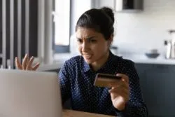 Woman stressed after overdraft fee regarding TD bank FAQ