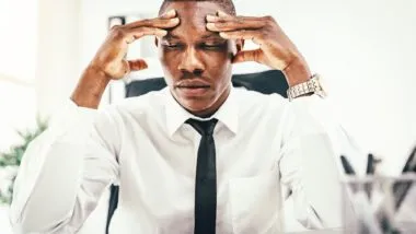 Upset working man regarding the systemic discrimination class action lawsuit