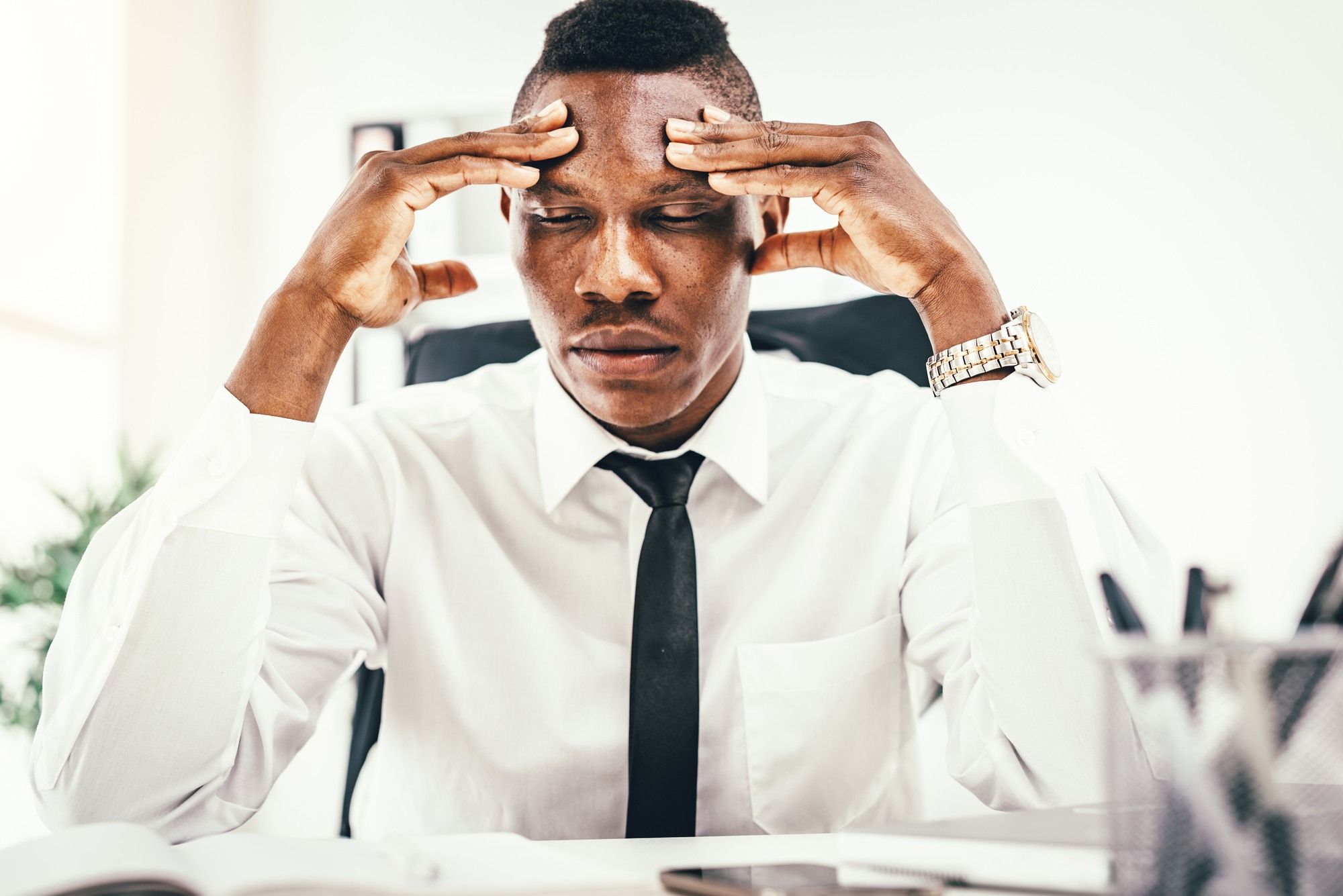 Upset working man regarding the systemic discrimination class action lawsuit 