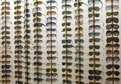 Sunglasses display regarding the Luxottica class action lawsuit