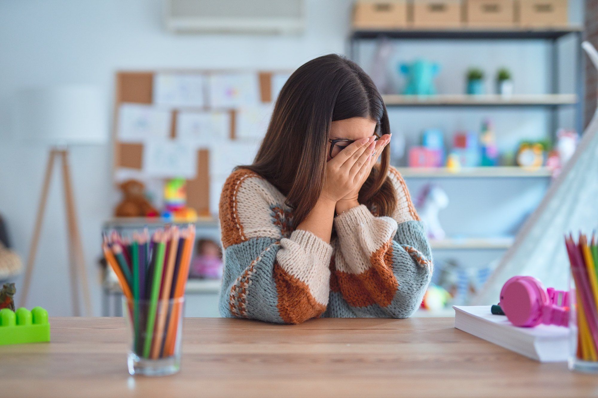 Stressed teacher regarding the female teachers' class action lawsuit filed