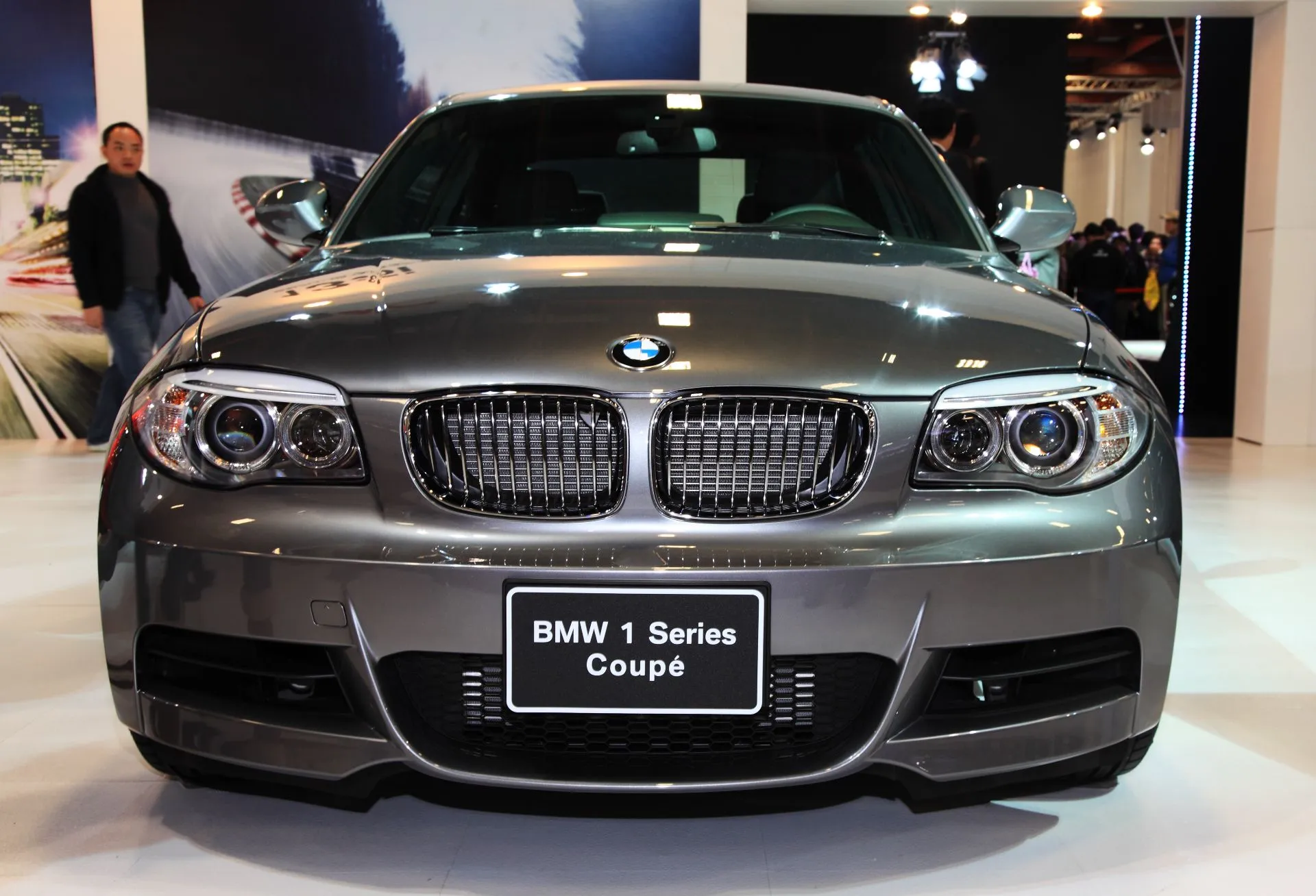 A BMW Series 1 is seen in a showroom - BMW Canada