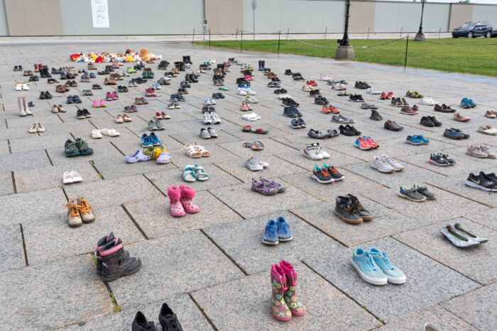 A memorial around Centennial Flame at Parliament Hill in Ottawa to honour the lives of 215 indigenous children whose remains were found in a mass grave in Kamloops, British Columbia.